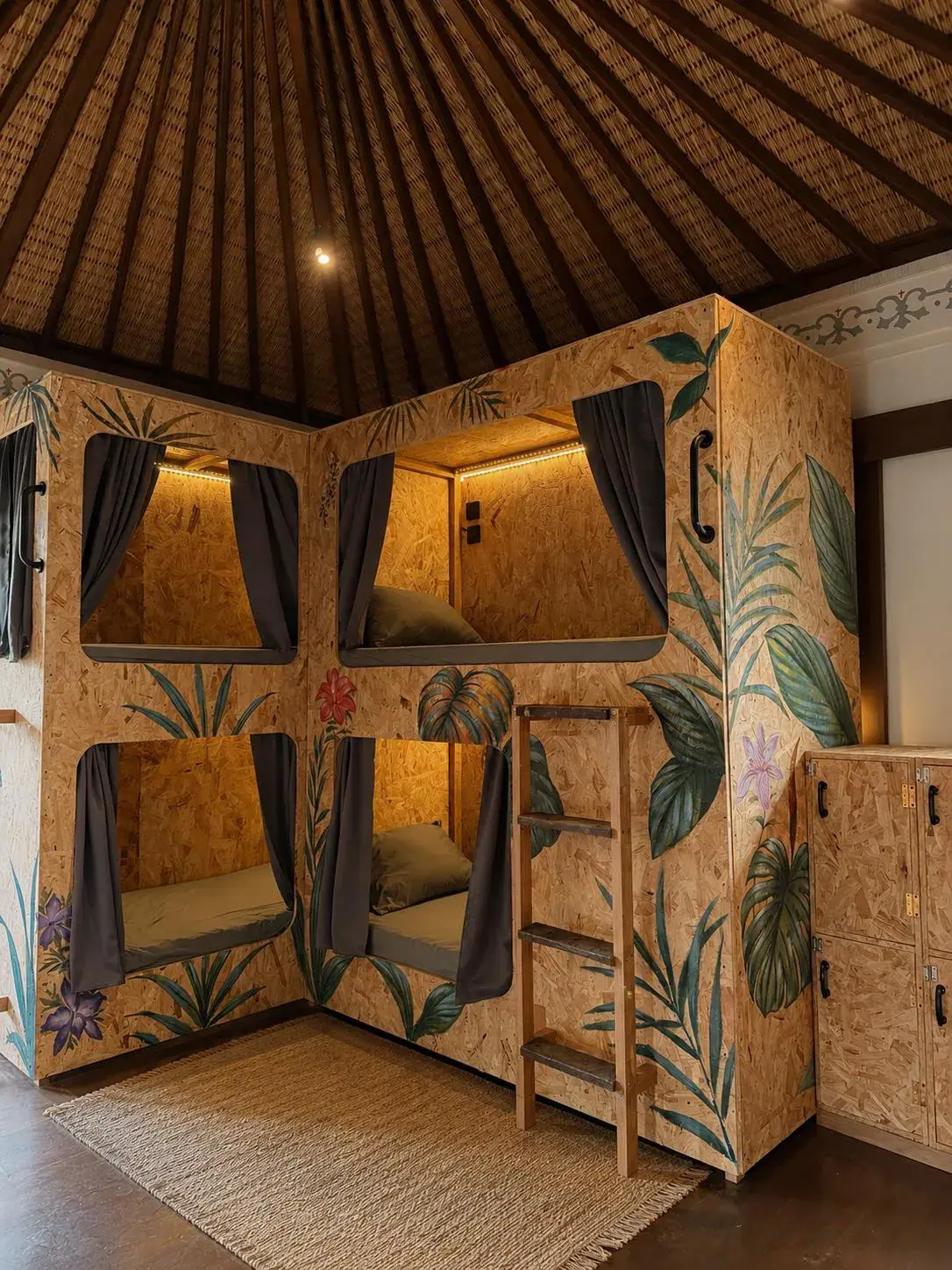 The female dorm, jungle-painted pods and lockers