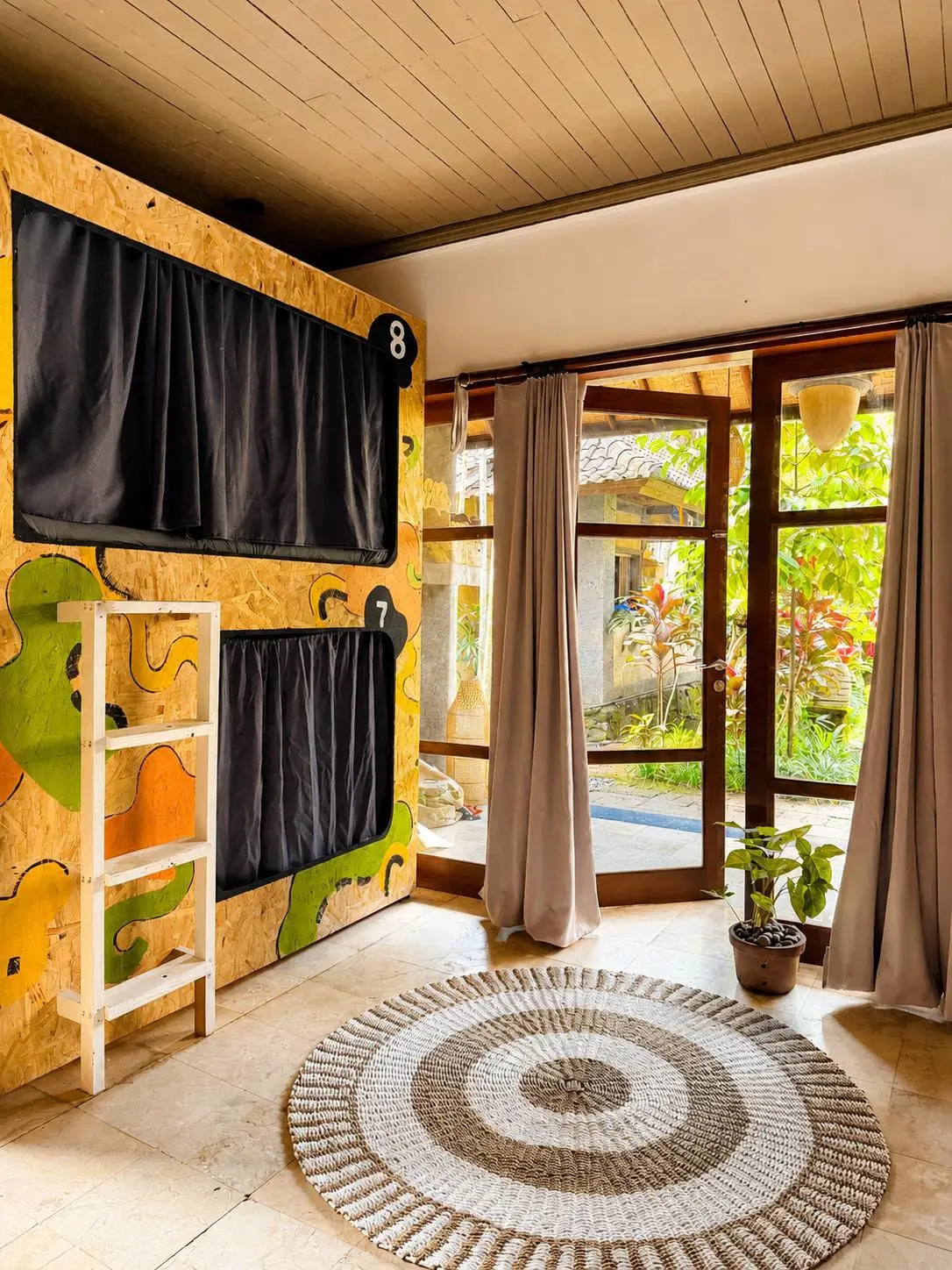 Garden doors, two steps from the pool.